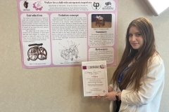Julia Jagodyńska i plakat z konferencji